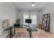 Bright bedroom with natural light, neutral walls, and a ceiling fan at 3636 Habersham Nw Rd # 2101, Atlanta, GA 30305