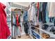 Walk-in closet featuring ample shelving, storage, and hanging space for organization at 3636 Habersham Nw Rd # 2101, Atlanta, GA 30305