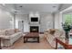 Community room with cozy seating, a fireplace, and neutral decor at 3636 Habersham Nw Rd # 2101, Atlanta, GA 30305