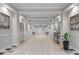 Community hallway with tile floors, artwork, seating, and decor at 3636 Habersham Nw Rd # 2101, Atlanta, GA 30305