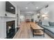 Open-concept living area with a fireplace and hardwood floors at 3636 Habersham Nw Rd # 2101, Atlanta, GA 30305