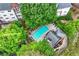 Aerial view of the pool surrounded by lush greenery and lounge chairs at 3636 Habersham Nw Rd # 2101, Atlanta, GA 30305