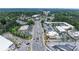 A busy street view shows a commercial district with a variety of businesses and cars at 3636 Habersham Nw Rd # 2101, Atlanta, GA 30305