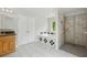 Updated bathroom features tiled shower, soaking tub, and light wood vanity at 4740 Union Hill Rd, Canton, GA 30115