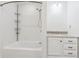 Bathroom features a tub/shower combo with caddy and vanity with granite countertop at 4740 Union Hill Rd, Canton, GA 30115