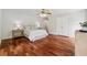 Spacious bedroom with hardwood floors, neutral walls, and ample closet space at 4740 Union Hill Rd, Canton, GA 30115