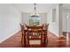 Formal dining room featuring hardwood floors, classic chandelier, and elegant dining set at 4740 Union Hill Rd, Canton, GA 30115