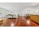 Cozy living space with hardwood floors, a fireplace, and an open layout perfect for entertaining at 4740 Union Hill Rd, Canton, GA 30115