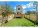 Backyard featuring a wooden deck, lawn, and privacy fence at 585 Ira Sw St, Atlanta, GA 30312