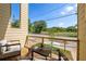 A cozy balcony space with comfortable seating and a view of the surrounding landscape at 585 Ira Sw St, Atlanta, GA 30312