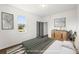Cozy bedroom with modern decor, hardwood floors, and plenty of natural light at 585 Ira Sw St, Atlanta, GA 30312
