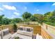 Outdoor deck with furniture overlooking a private backyard, great for relaxing and entertaining at 585 Ira Sw St, Atlanta, GA 30312