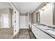 Bathroom featuring granite counters, wood grain floors, and stand up shower at 60 Whispering Pine Ct, Covington, GA 30016