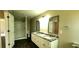 Modern bathroom with dual sinks, granite countertops, and a stand up shower at 60 Whispering Pine Ct, Covington, GA 30016