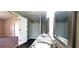 Modern bathroom with dual sinks, granite countertops, and a stand up shower at 60 Whispering Pine Ct, Covington, GA 30016