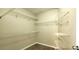 Walk-in closet with carpet and multiple levels of wire shelving for optimal storage at 60 Whispering Pine Ct, Covington, GA 30016