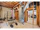 Spacious unfinished basement area with exposed ductwork and workout equipment at 815 Lake Forest Pass, Roswell, GA 30076