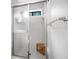 Updated bathroom with a tiled shower, glass door, and built-in bench at 815 Lake Forest Pass, Roswell, GA 30076