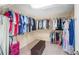 Walk-in closet with ample shelving and storage, providing organized space for clothing and accessories at 103 Harvest Rdg, Acworth, GA 30102