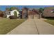 Inviting home showcasing lush green lawn and a double garage at 103 Harvest Rdg, Acworth, GA 30102