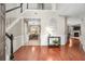 Elegant foyer featuring hardwood floors, staircase, and dining room view at 103 Harvest Rdg, Acworth, GA 30102