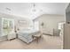 Spacious main bedroom featuring neutral decor, a vaulted ceiling, and ample natural light at 103 Harvest Rdg, Acworth, GA 30102