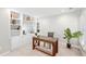 This office features custom built-in shelving and a stylish desk, creating an ideal workspace with natural light at 103 Harvest Rdg, Acworth, GA 30102