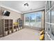 Bright office space with a large window providing plenty of natural light and built in shelves at 103 Harvest Rdg, Acworth, GA 30102