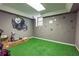 Finished basement with sports decor, perfect for recreation or play area at 130 Brandon Mill Cir, Fayetteville, GA 30214