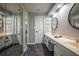 Bathroom featuring double sinks, mirror and access to bath and shower area at 130 Brandon Mill Cir, Fayetteville, GA 30214