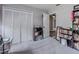 Neutral bedroom with carpet, large closet, and bookshelves, providing ample storage at 130 Brandon Mill Cir, Fayetteville, GA 30214