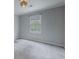 The neutral-colored bedroom provides a calming and relaxing atmosphere at 130 Brandon Mill Cir, Fayetteville, GA 30214