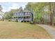 Beautiful two-story home with a welcoming front porch at 130 Brandon Mill Cir, Fayetteville, GA 30214