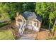 An aerial view showcasing a two-story home with manicured lawn and driveway at 2114 Lindley Nw Ln, Kennesaw, GA 30144