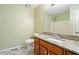 The main bathroom features a granite-topped vanity, tile floors, and a large mirror at 2114 Lindley Nw Ln, Kennesaw, GA 30144