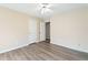 Bedroom with a ceiling fan and hardwood floors, creating a cozy and inviting space at 2114 Lindley Nw Ln, Kennesaw, GA 30144