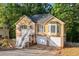 Charming two-story home featuring a brick foundation, white stairs, and a well-manicured lawn at 2114 Lindley Nw Ln, Kennesaw, GA 30144