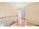 Bright entryway featuring hardwood floors and a decorative front door at 2114 Lindley Nw Ln, Kennesaw, GA 30144