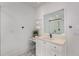 Bright white bathroom featuring vanity sink with designer faucet at 300 Massengale Rd, Brooks, GA 30205