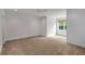 Large bright bedroom with carpet and window at 300 Massengale Rd, Brooks, GA 30205
