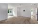 Spacious bedroom with neutral carpet, white walls, and natural light from the window at 300 Massengale Rd, Brooks, GA 30205
