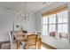 Dining room with natural light and windows showcasing plants and trees for nature lovers at 300 Massengale Rd, Brooks, GA 30205