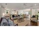 Spacious living room with view into kitchen and dining area; great layout for entertaining at 300 Massengale Rd, Brooks, GA 30205