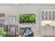 Living room with view of pool, and kitchen bar with seating at 300 Massengale Rd, Brooks, GA 30205