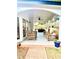 Covered patio with comfortable seating, perfect for outdoor entertaining and relaxing at 805 Doe Hill Ln, Roswell, GA 30075