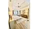 Serene main bedroom with tray ceiling, neutral decor, and hardwood floors at 805 Doe Hill Ln, Roswell, GA 30075