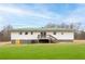 Exterior view of house featuring a large backyard at 118 Wheelan School Rd, Dallas, GA 30157