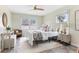 Inviting bedroom with a comfortable bed, decorative pillows, and ample natural light at 118 Wheelan School Rd, Dallas, GA 30157
