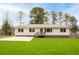 Charming single-story home with a well-maintained lawn and a concrete driveway at 118 Wheelan School Rd, Dallas, GA 30157