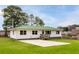 Charming single-story home featuring a green metal roof, white siding, and a spacious front yard at 118 Wheelan School Rd, Dallas, GA 30157
